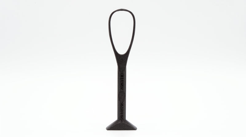 Black CHASINSMILES Tongue Refresher standing upright on its self-standing base